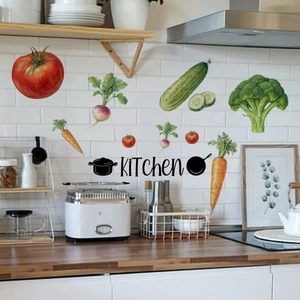 Detail of colorful kitchen wall stickers with realistic vegetables and KITCHEN lettering