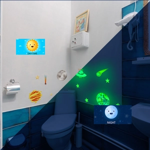 Glow-in-the-dark space theme wall decals showing daytime vs night luminescence on tiles