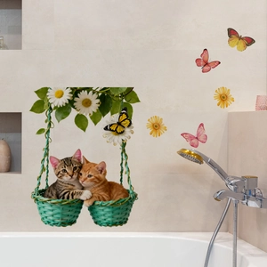 Détail de stickers muraux PVC avec d'adorables chatons dans des paniers sur carrelage