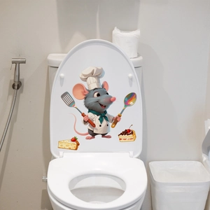 Detail view of a cartoon chef mouse wall sticker applied to a white bathroom toilet lid