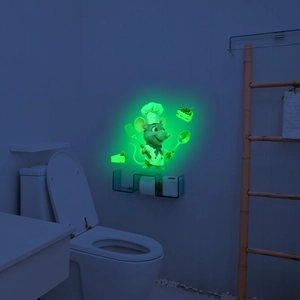 Glow in the dark wall sticker featuring a cartoon chef mouse and cake in the bathroom