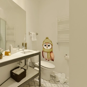 Luminous wall sticker featuring a cute owl with a yellow hat and scarf for bathroom decor