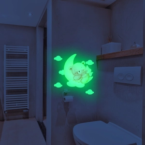 Glow-in-the-dark wall sticker featuring a bear on a moon with clouds in green neon light