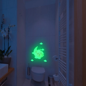 Glow-in-the-dark wall sticker featuring a cute bear on a crescent moon with clouds