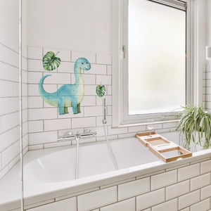 Close-up of a blue watercolor dinosaur wall sticker on white bathroom tiles