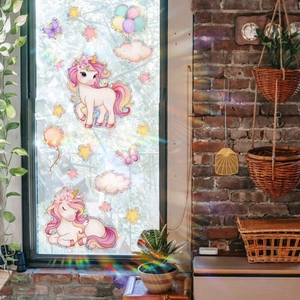 Prism window sticker set showing unicorn and butterfly rainbows under direct sunlight