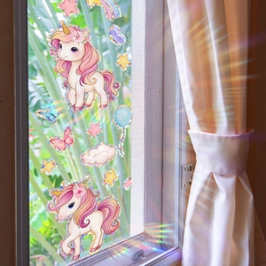 Prism unicorn and butterfly window decals creating rainbow sun catcher light effects