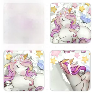 Close-up of double-sided rainbow unicorn window stickers showing front and reverse details