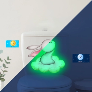 Luminous wall sticker showing daytime design and night glowing rabbit effect