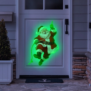 Luminous Santa Claus Christmas door decoration with green glowing edges on white door