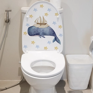 Luminous toilet sticker featuring watercolor whale, sailing boat and star decorations