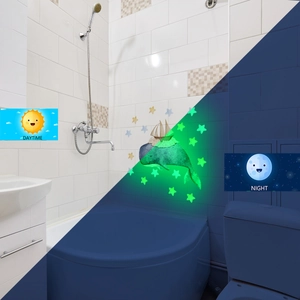 Glow-in-the-dark wall stickers showing whale and stars in daytime and night vision
