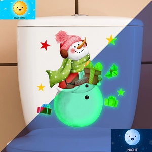 Luminous Christmas snowman sticker showing daytime look and glowing nighttime effect