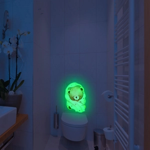 Luminous wall sticker featuring a sleeping cartoon bear with green glow in the dark effect