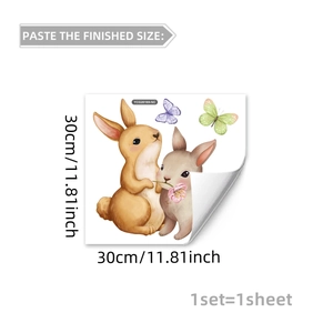 Detailed view of luminous wall sticker showing cute cartoon rabbit and butterfly patterns