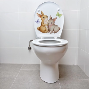 Luminous elf girl mushroom butterfly toilet stickers on white ceramic cover in bathroom