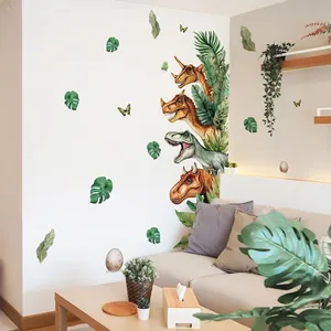 Wandtattoos mit Cartoon Dinosaurierköpfen und Tropenblättern für das Kinderzimmer