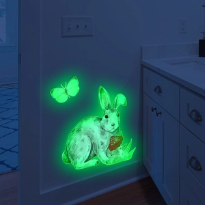 Luminous wall stickers showing realistic rabbit and butterfly glowing in fluorescent green