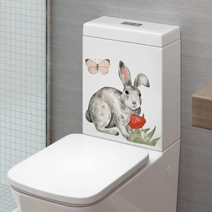 Luminous elf girl mushroom rabbit and butterfly stickers on a white ceramic toilet tank