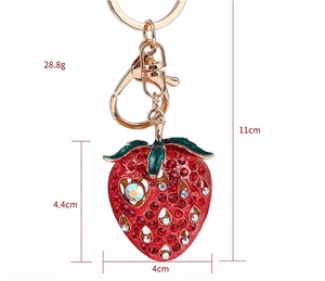 Detailed strawberry keychain dimensions showing height 4.4cm and weight 28.8g on white background