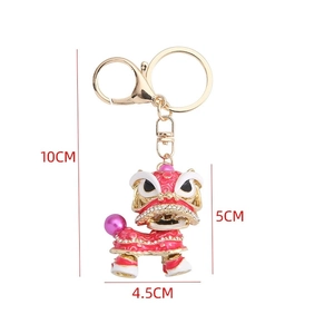Traditional Chinese lion dance keychain with red enamel and rhinestones for bags