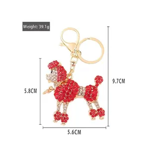 Porte-clés Caniche étincelant avec cristaux rouges et blancs pour sacs à main et sacs à dos