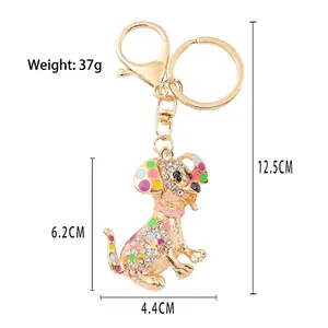 Dalmatian dog keychain with sparkling rhinestones and colorful enamel on a gold ring