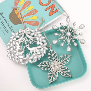 Three-piece silver snowflake and reindeer Christmas ornaments with crystal rhinestones