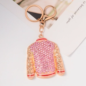 Detail of pink rhinestone jacket keychain with rose gold finish and lobster clasp