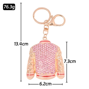 Rose gold jacket keychain with pink rhinestones, dimensions shown on white backdrop