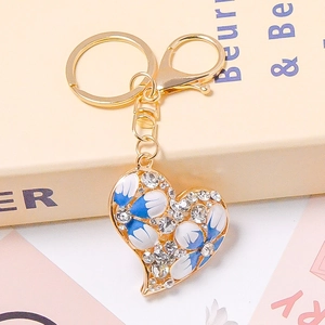 Goldener Herz-Schlüsselanhänger mit blauen Emaille-Blumen und Strass für Taschen