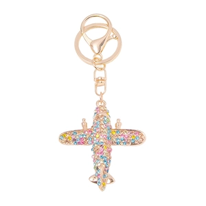 Golden airplane keychain with colorful rhinestones and secure lobster clasp on white background