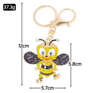 Porte-clés abeille doré avec cristaux brillants et émail noir sur fermoir homard