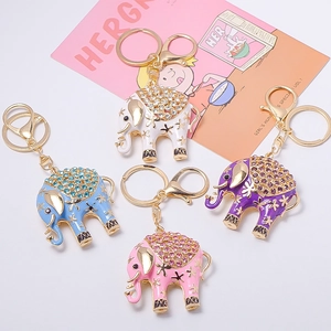Creative elephant keychains with rhinestones and floral patterns in four vibrant colors