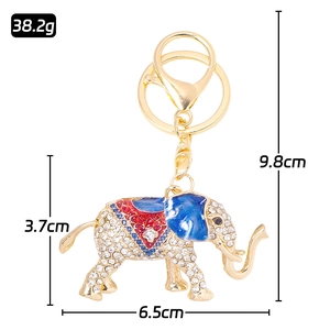Sparkling elephant keychain with crystal rhinestones and enamel details on gold metal
