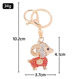 Porte-clés chèvre dorée avec strass, poids 34g et longueur totale de 10,2cm