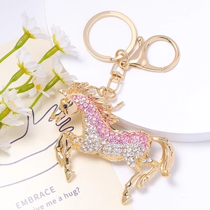 Porte-clés licorne étincelant avec strass roses et finition en alliage doré chic