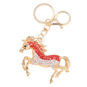 Porte-clés cheval créatif en métal doré avec décoration de strass rouges et blancs