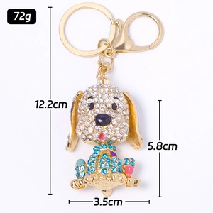 Portachiavi a forma di cane dorato con cristalli bianchi e blu, lungo 12,2 cm