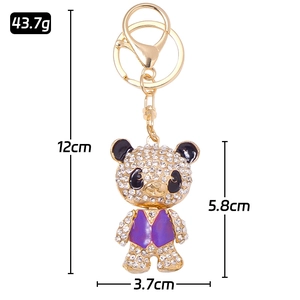 Sparkling rhinestone panda bear keychain in purple vest with metallic gold plating