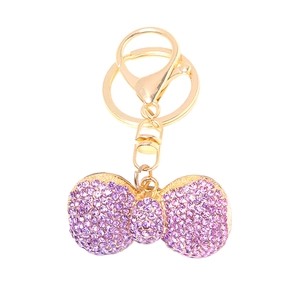 Sparkling purple rhinestone bow keychain with golden alloy ring and snap hook for bags