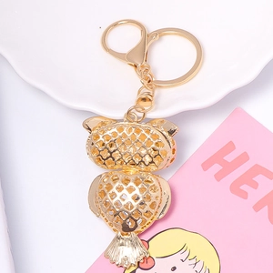 Porte-clés chouette cœur doré avec strass de luxe et fermoir mousqueton en métal