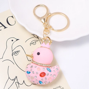 Pink resin crown duck keychain with rhinestones and colorful crystals on gold ring