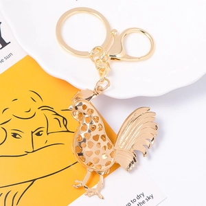 Gold rooster keychain with crystal hollow heart design and lobster clasp for bags