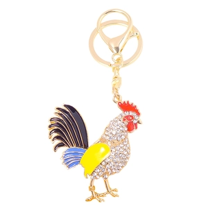 Sparkling crystal rooster keychain with colorful enamel wings on a golden lobster clasp