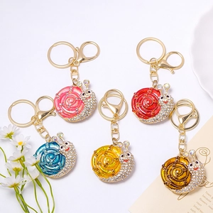 Luxury rhinestone snail metal keychains in pink red blue yellow and bronze gold
