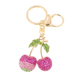 Porte-clés cerise en cristaux roses et verts avec anneau et fermoir en métal doré