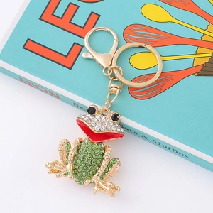 Creative green rhinestone frog keychain with gold alloy plating and lobster clasp on book