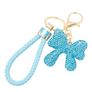 Sparkling blue rhinestone bow keychain with braided leather strap and gold metal hardware