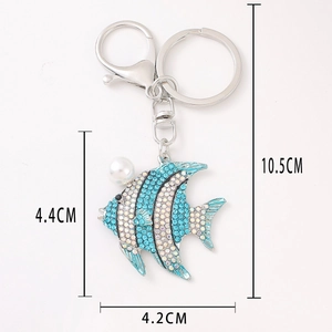 Enamel fish keychain with blue rhinestones and pearl accent, 10.5cm total length